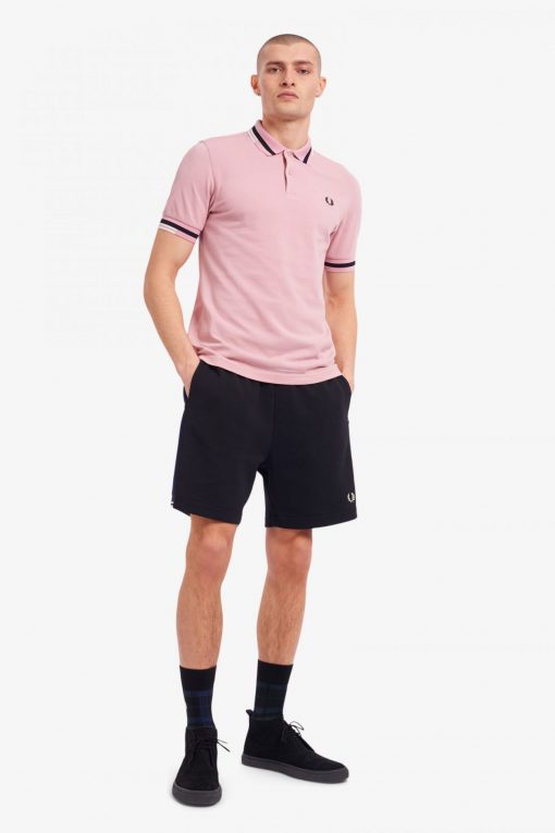 Fred Perry Skip to the beginning of the images gallery Abstract Tipped Polo Shirt Chalk Pink